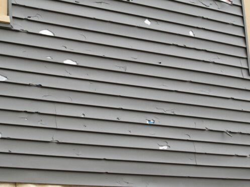 Cracked gray siding