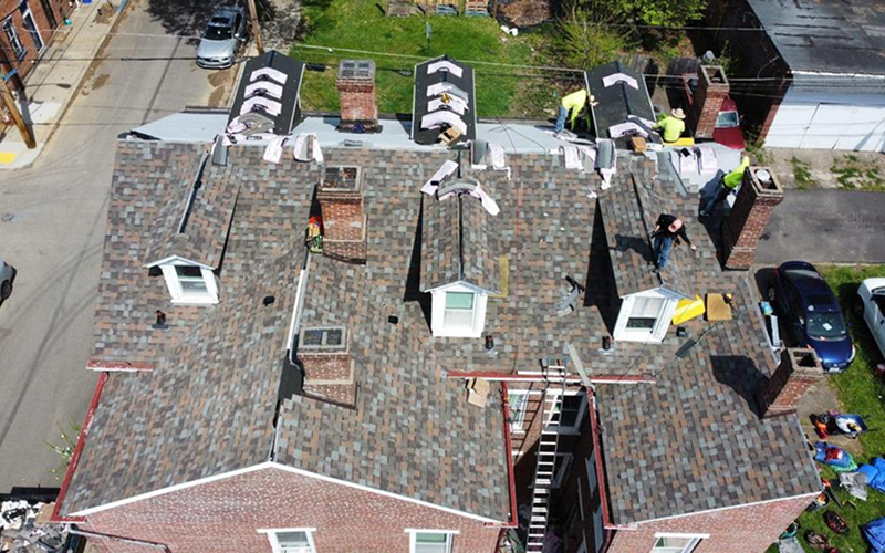 Repaired asphalt shingle roof on a Pittsburgh home