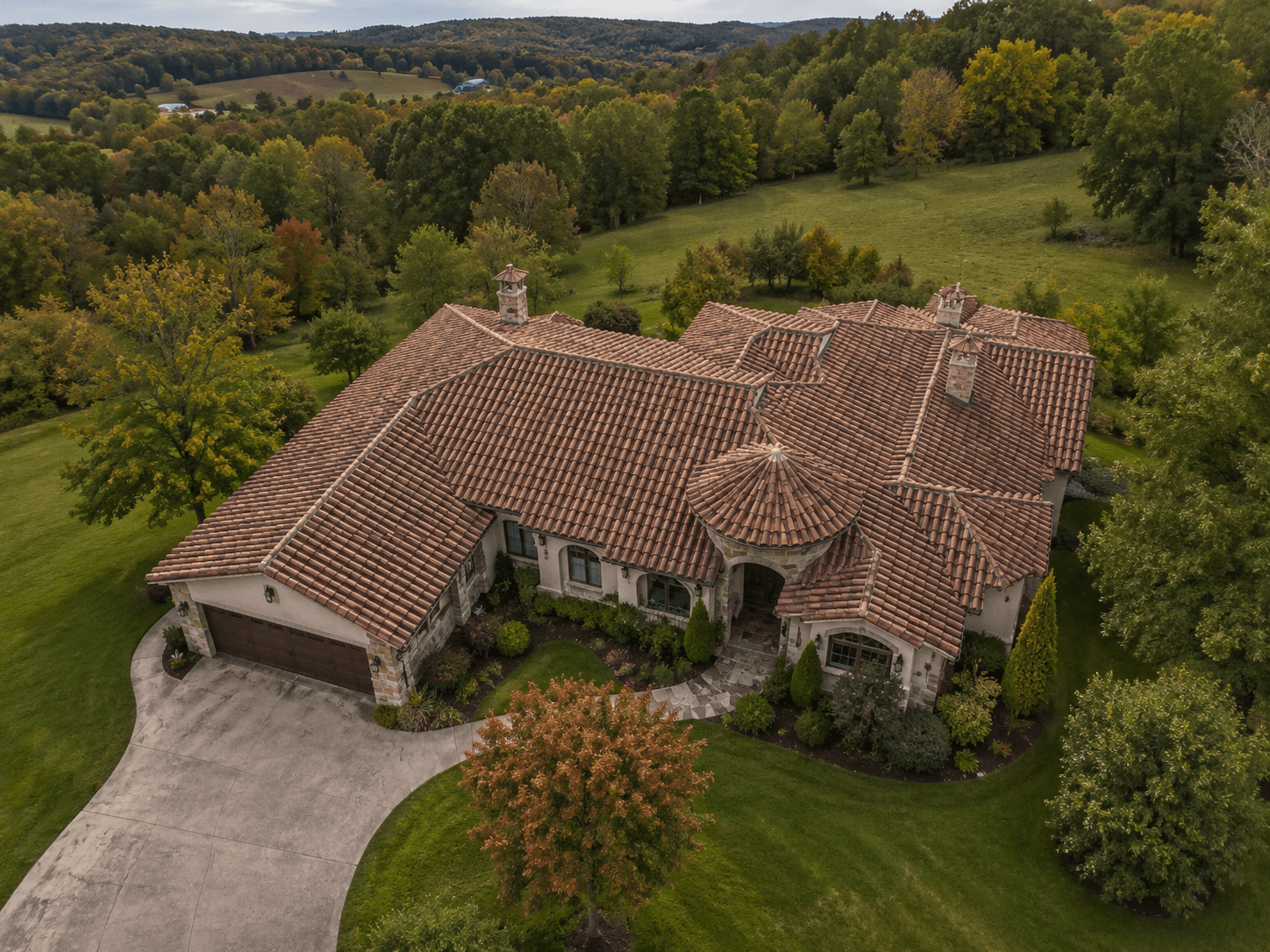 House with a terracotta tile roof showing hips, valleys and multiple slopes