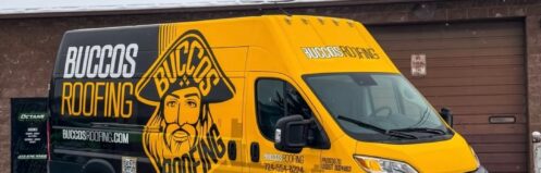 Buccos Roofing branded service truck parked at a Pittsburgh-area residential home