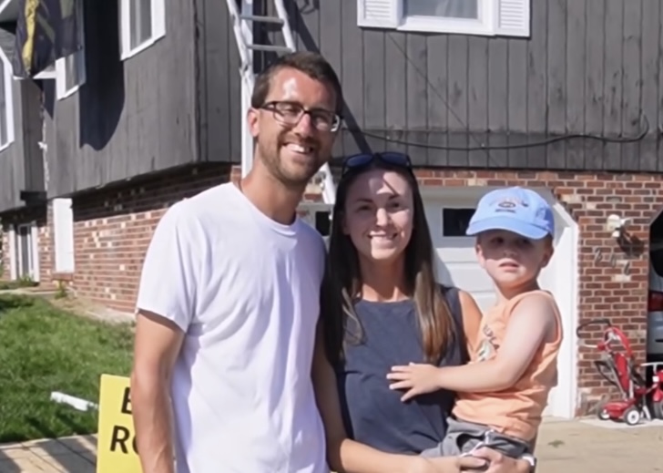 Family standing outside their home after receiving help from Buccos Roofing.